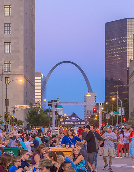 The St. Louis Arch with flower blossoms